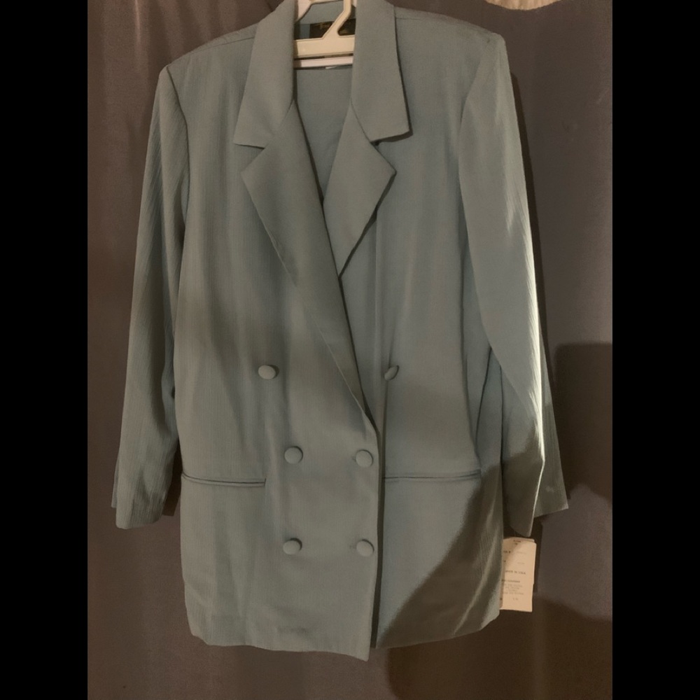 Double breasted suit with skirt